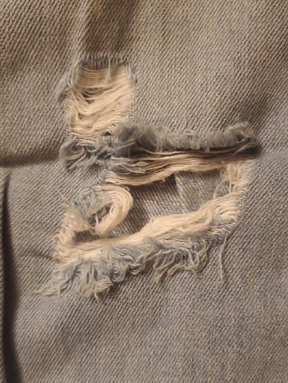 Light Wash Distressed Ripped Jeans - Picture 5 of 9